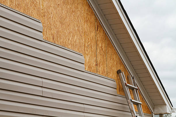 Professional Siding Installation technician working in Brighton, CO